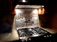 Loons swimming in lake  mosaic   kitchen backsplash .. Client had me redesign her photo as a mosaic