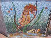 closeup of glass sea horse mosaic