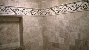 Scroll work border mosaic bathroom installation