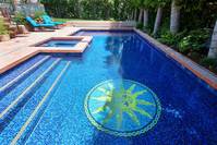 sun medallion  mosaic at bottom of pool