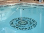 Medallion  mosaic at bottom of pool