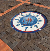 Monogrammed compass rose in driveway ...mosaic installation