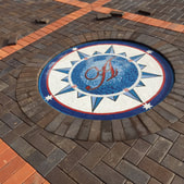 Monogrammed compass rose mosaic installation