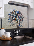 Floral mosaic kitchen backsplash installation