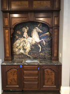Horse and fashion rider mosaic for wine room.. has gold metallic accents.. dramatic